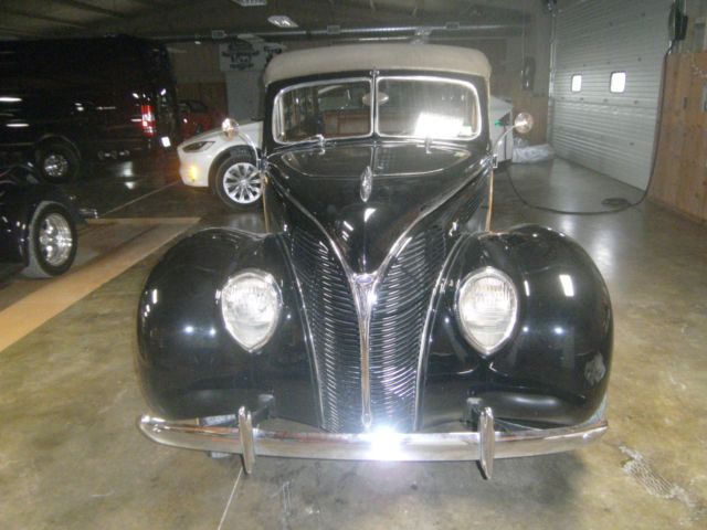 1938 Black Ford Deluxe Wagon