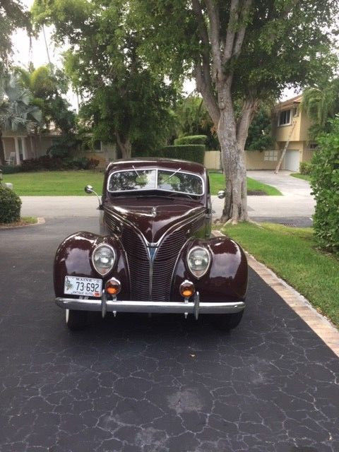 1938 Burgundy Ford Model 81 A Sedan