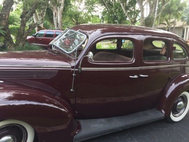 1938 Burgundy Ford Model 81 A Sedan