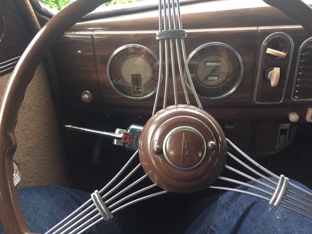 1938 Burgundy Ford Model 81 A Sedan