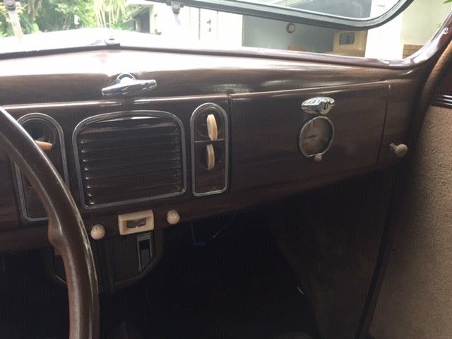 1938 Burgundy Ford Model 81 A Sedan