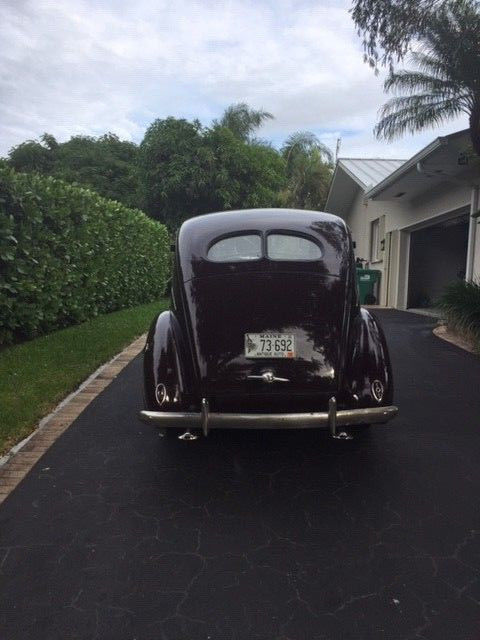1938 Burgundy Ford Model 81 A Sedan