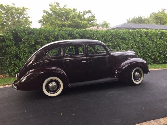 1938 Burgundy Ford Model 81 A Sedan