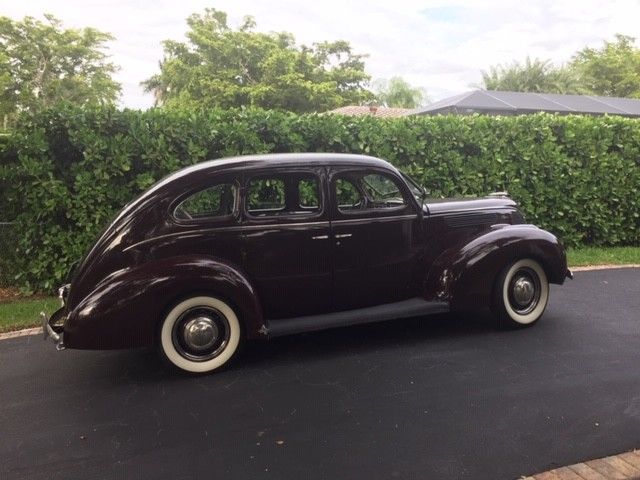 1938 Burgundy Ford Model 81 A Sedan