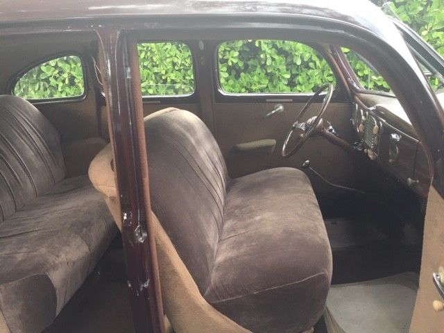 1938 Burgundy Ford Model 81 A Sedan