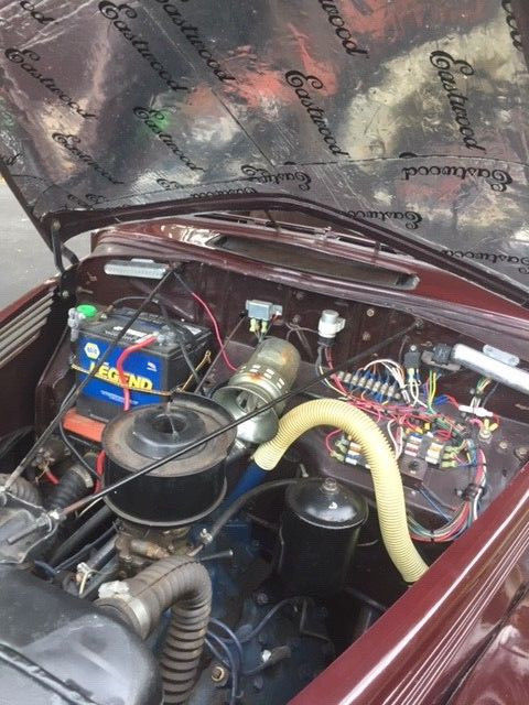 1938 Burgundy Ford Model 81 A Sedan