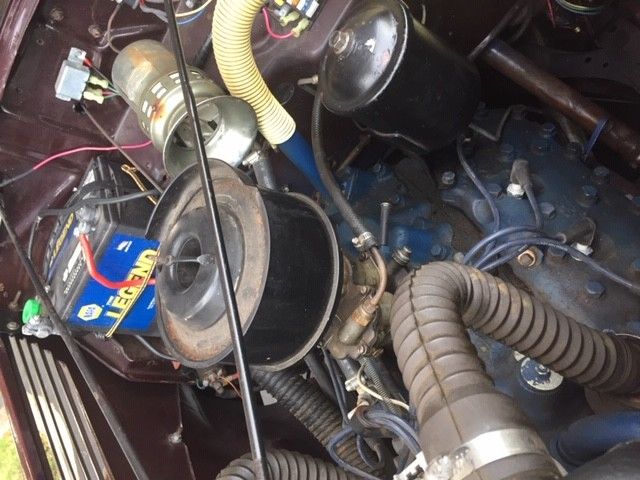 1938 Burgundy Ford Model 81 A Sedan