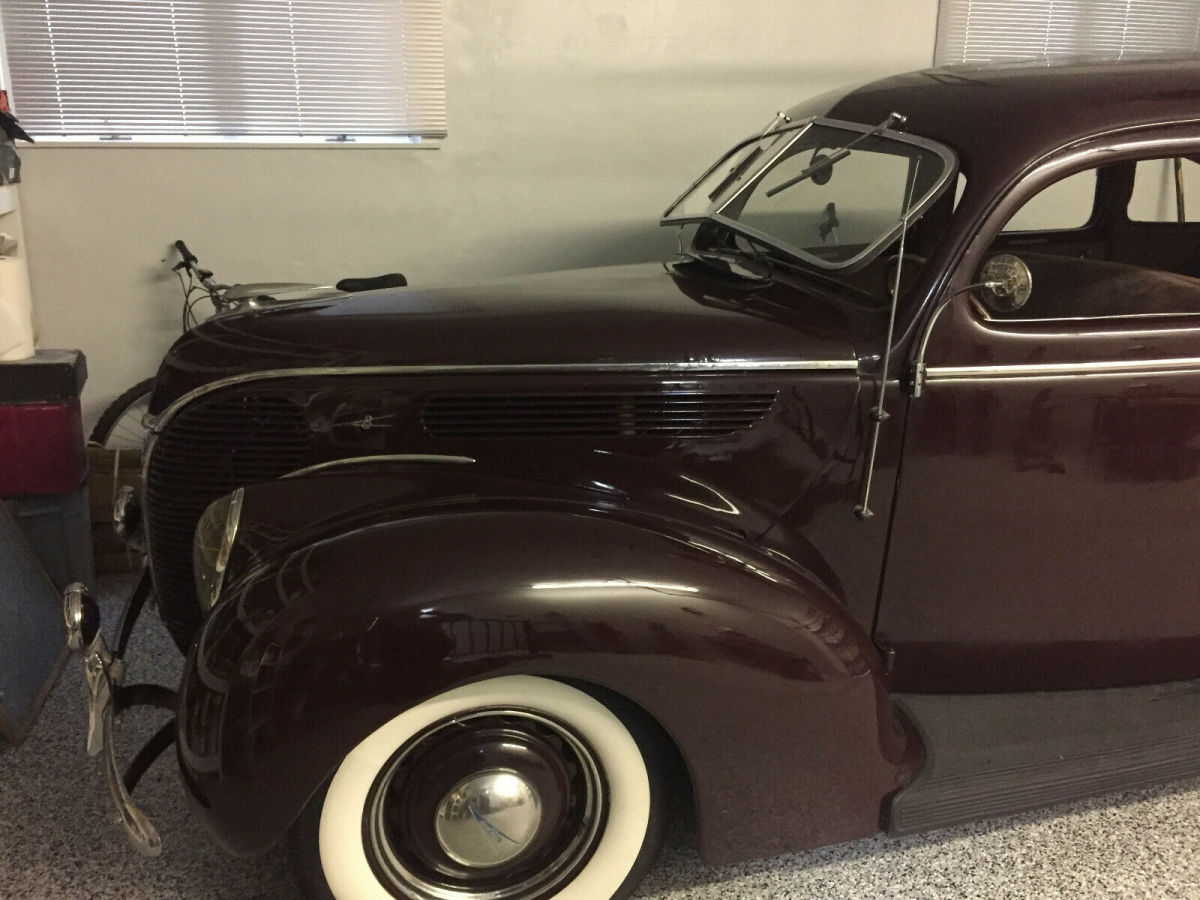 1938 Burgundy Ford Model 81 A Sedan