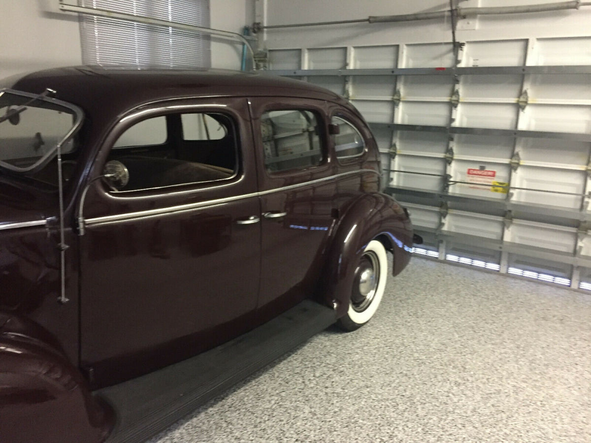 1938 Burgundy Ford Model 81 A Sedan