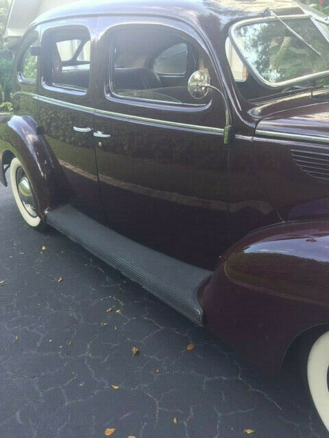 1938 Burgundy Ford Model 81 A Sedan