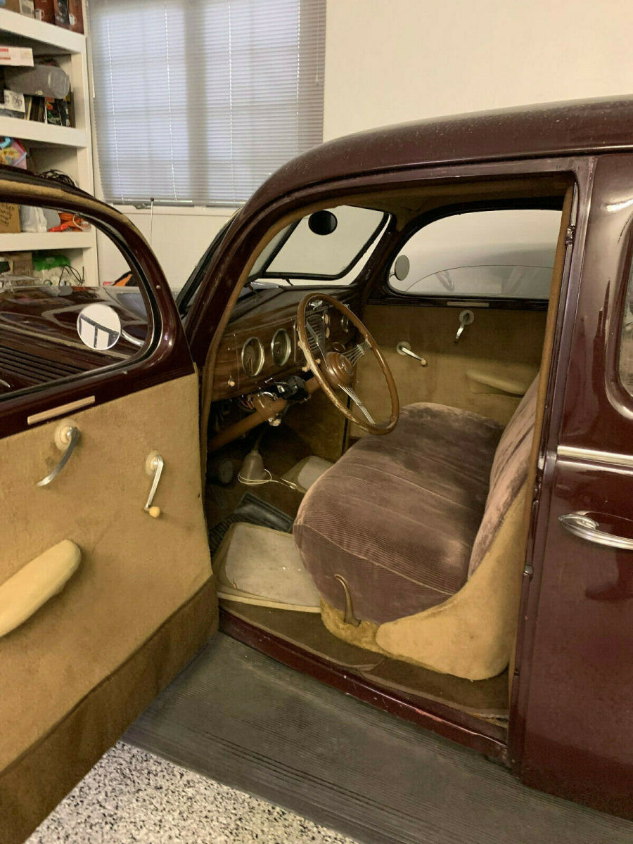 1938 Burgundy Ford Model 81 A Sedan