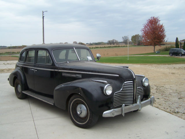 1940 black Buick Century 4 door suicide style
