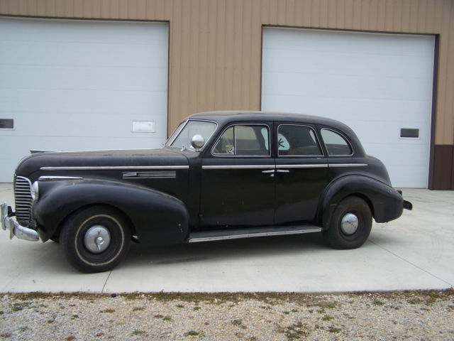 1940 black Buick Century 4 door suicide style