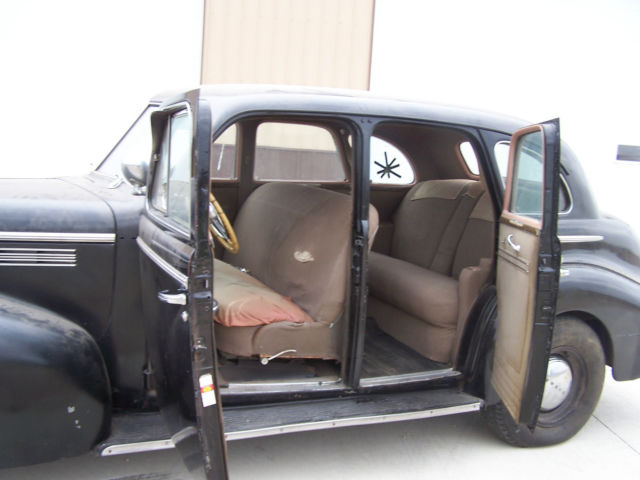 1940 black Buick Century 4 door suicide style