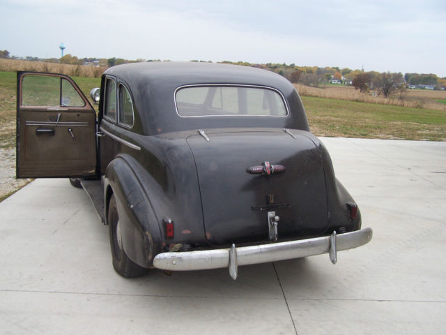 1940 black Buick Century 4 door suicide style