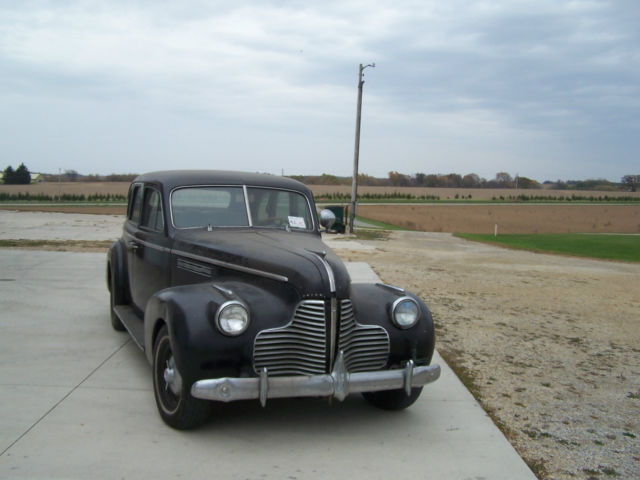 1940 black Buick Century 4 door suicide style