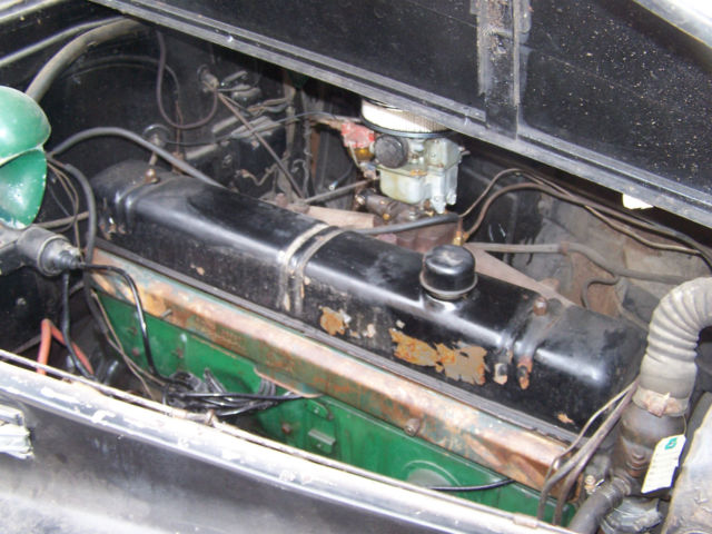 1940 black Buick Century 4 door suicide style