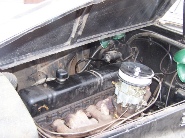 1940 black Buick Century 4 door suicide style