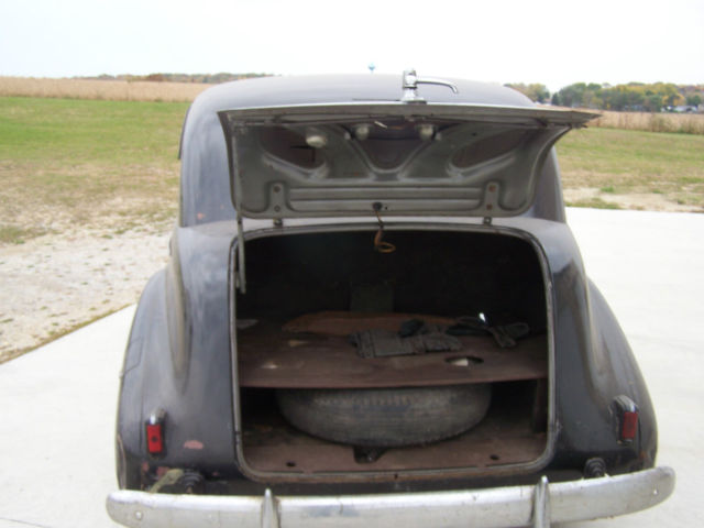 1940 black Buick Century 4 door suicide style
