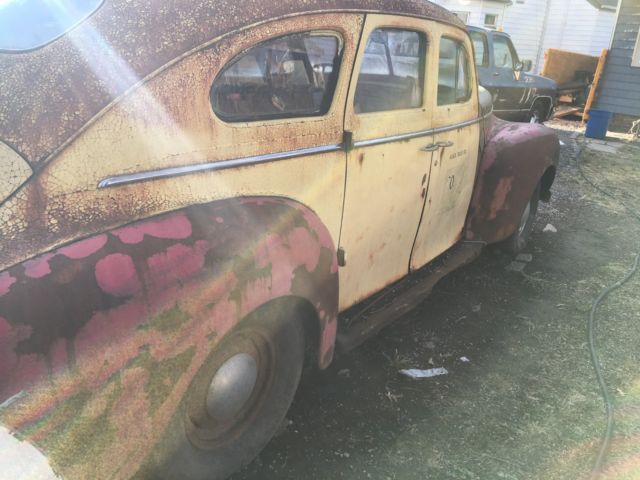 1940 yellow /red Chrysler Windsor