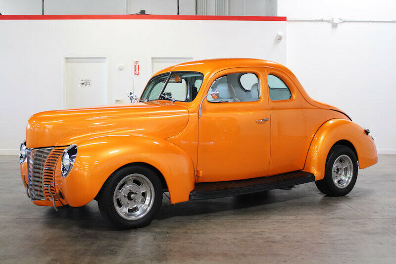1940 Orange Ford Deluxe Coupe