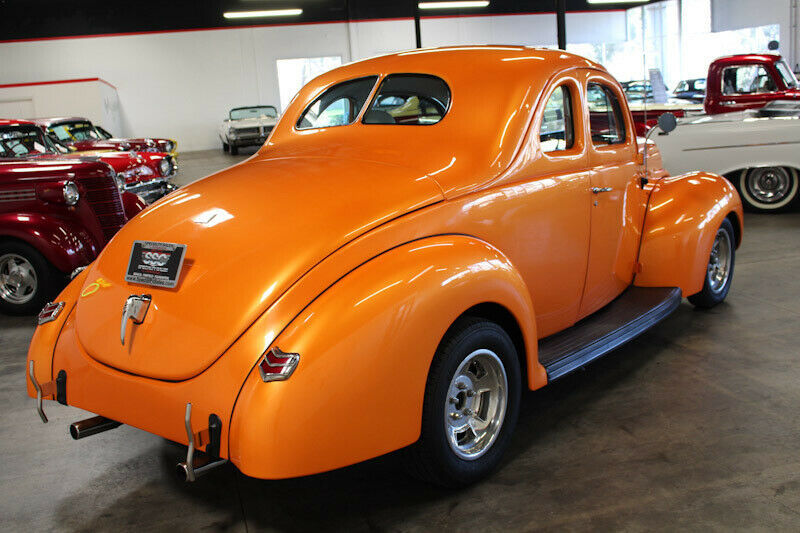 1940 Orange Ford Deluxe Coupe