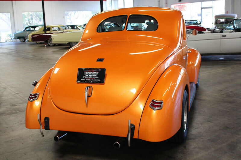 1940 Orange Ford Deluxe Coupe