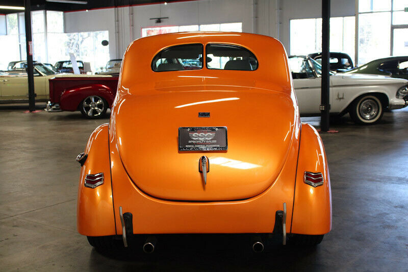 1940 Orange Ford Deluxe Coupe