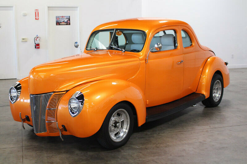 1940 Orange Ford Deluxe Coupe