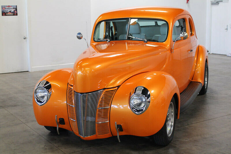 1940 Orange Ford Deluxe Coupe