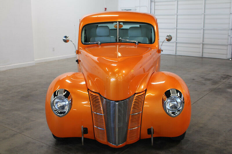 1940 Orange Ford Deluxe Coupe