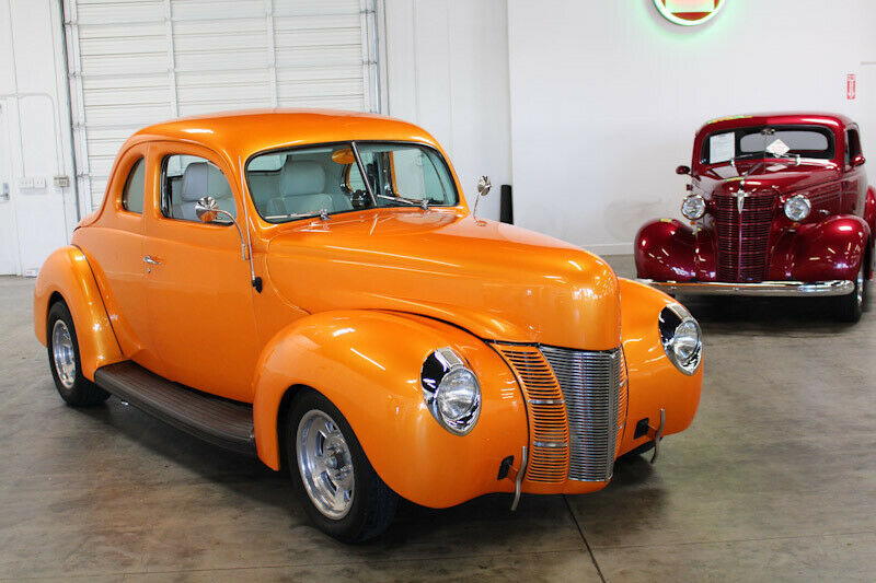 1940 Orange Ford Deluxe Coupe