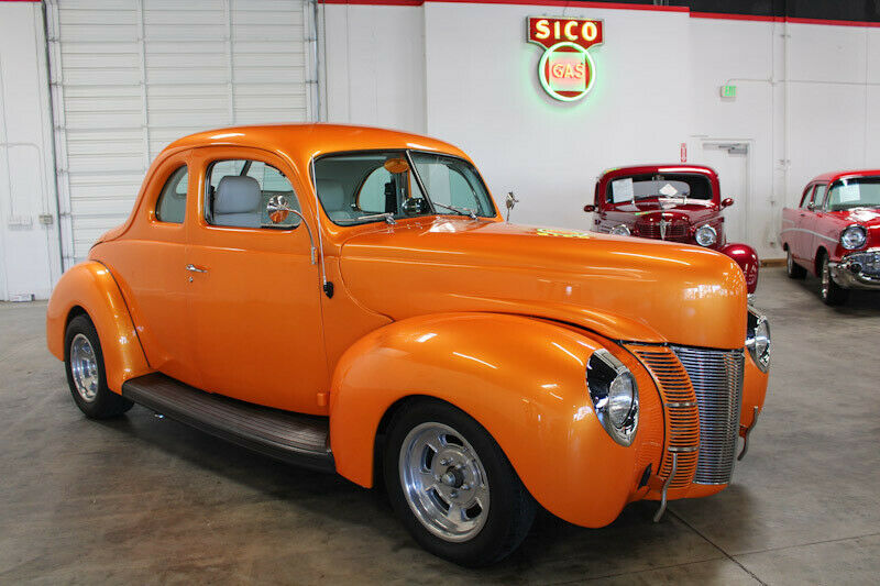 1940 Orange Ford Deluxe Coupe