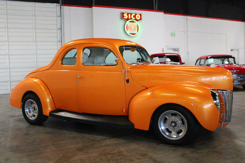 1940 Orange Ford Deluxe Coupe