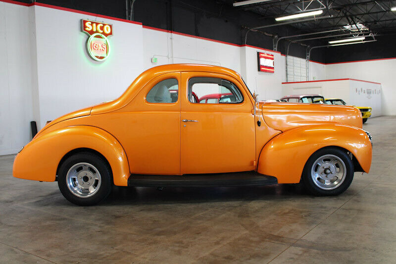 1940 Orange Ford Deluxe Coupe