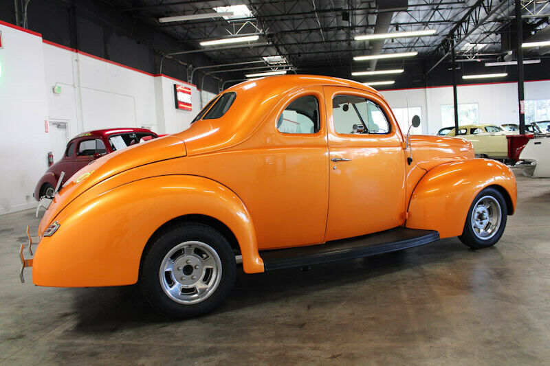 1940 Orange Ford Deluxe Coupe