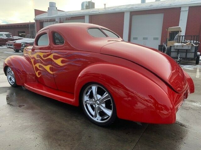 1940 Red Ford Deluxe Coupe