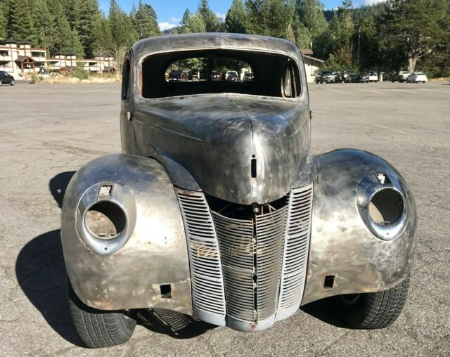 1940 Unpainted natural steel Ford Deluxe Coupe