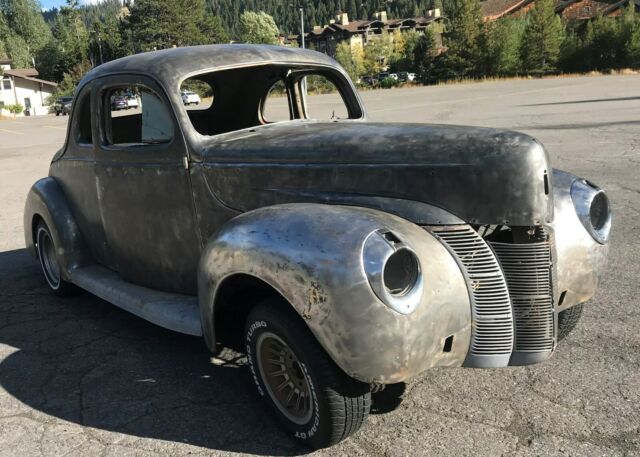 1940 Unpainted natural steel Ford Deluxe Coupe