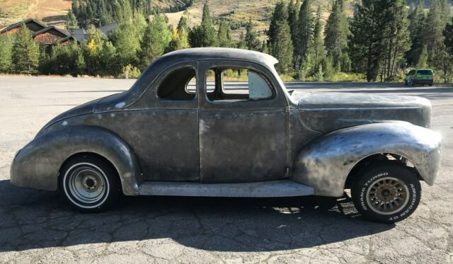 1940 Unpainted natural steel Ford Deluxe Coupe