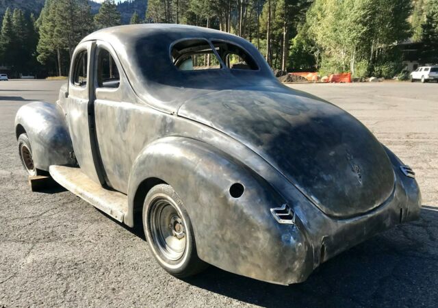 1940 Unpainted natural steel Ford Deluxe Coupe