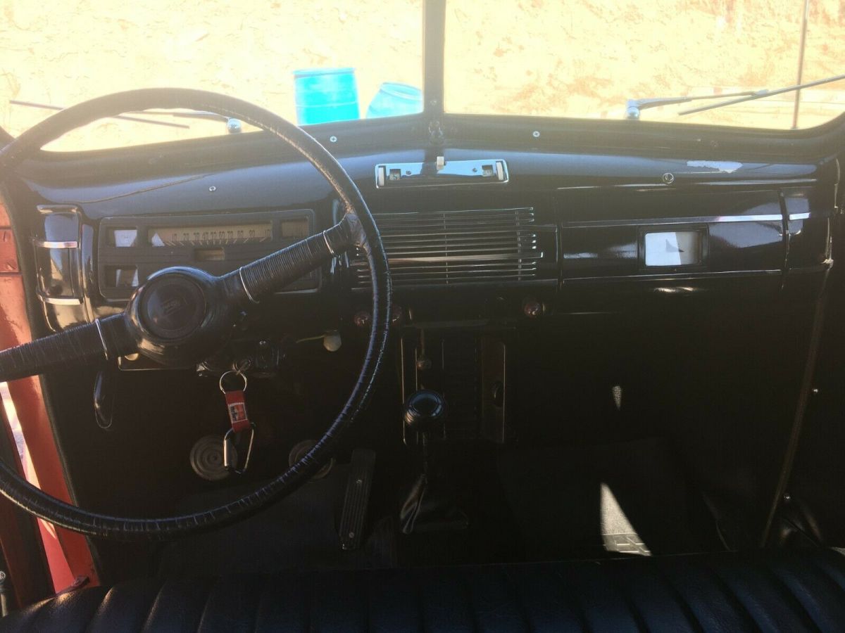 1940 Red Ford Deluxe Sedan