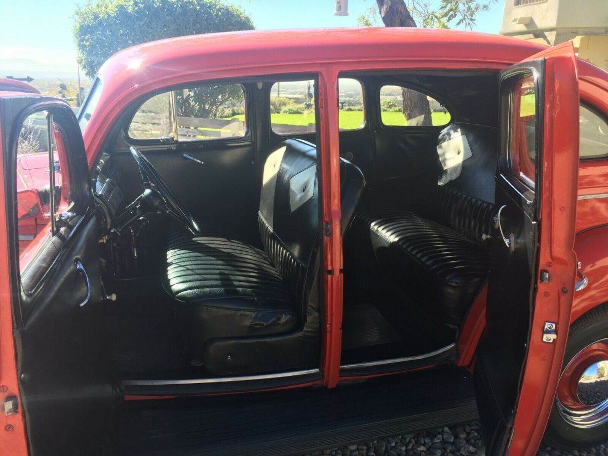 1940 Red Ford Deluxe Sedan