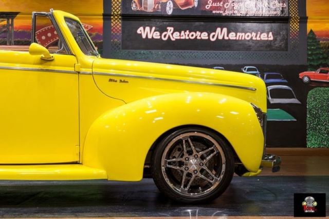 1940 Yellow Ford Deluxe Convertible