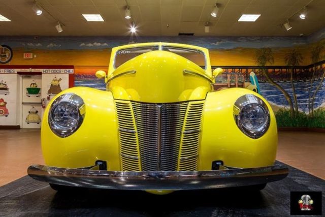 1940 Yellow Ford Deluxe Convertible