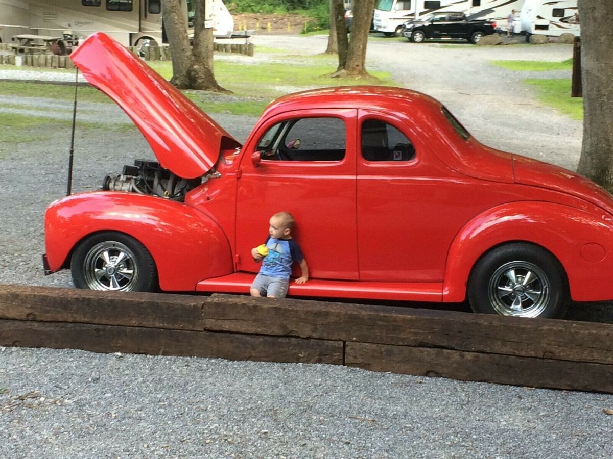 1940 Red Ford Deluxe Coupe