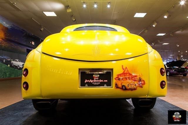 1941 Maroon Ford Deluxe Convertible