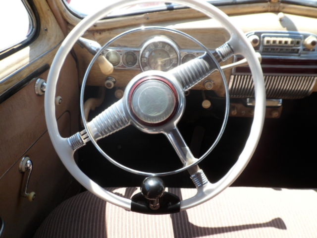 1946 Burgundy Pontiac Streamliner Sedan