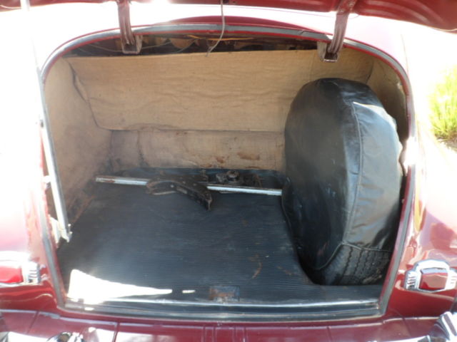 1946 Burgundy Pontiac Streamliner Sedan