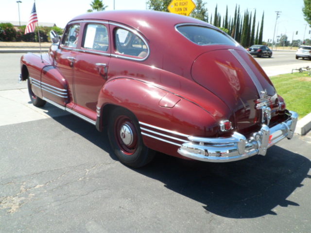 1946 Burgundy Pontiac Streamliner Sedan
